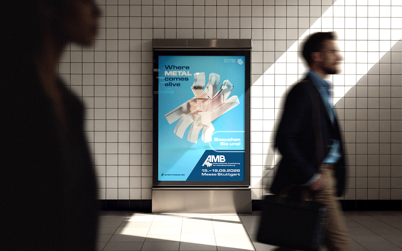 AMB 2026 City-Light-Plakat in U-Bahn-Station mit „Where Metal comes alive“ Motiv